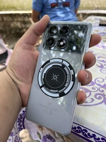 notbuk islenmis: Poco X6 pro 5G boz rəngli smartfon nazik dizayna və metal çərçivəyə — 7