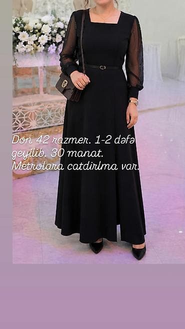 Qara rəngli, zövqlü uzun don. 42 razmerdir. Model kvadrat yaxalıqla