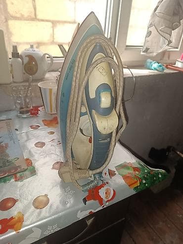 Buxarlı ütü - Tip: Elektrik buxarlı ütü - Material: Metaldan altlıq