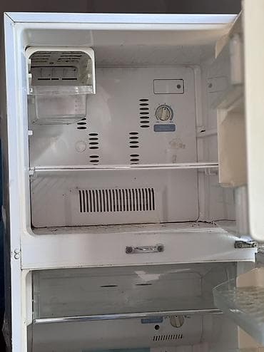 lotus soyuducu: İşlənmiş 2 qapılı Toshiba Soyuducu Satılır, rəng - Ağ, Təkərli — 3
