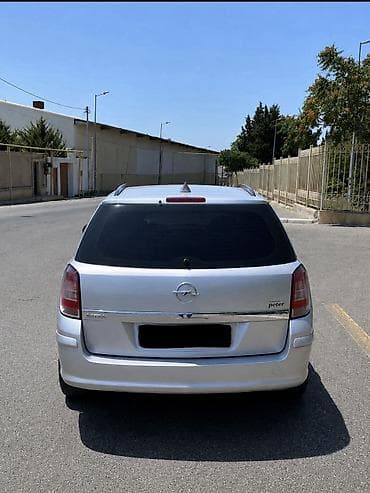 astra al: Opel Astra: 1.4 l | 2007 il 300000 km Universal — 6