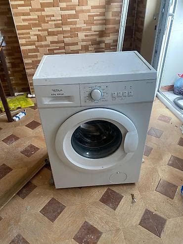 pencere altliqlari: Tesla paltaryuyan maşın – önyükləməli, 6.5 kq tutum, 1000 dövr/dəq — 1