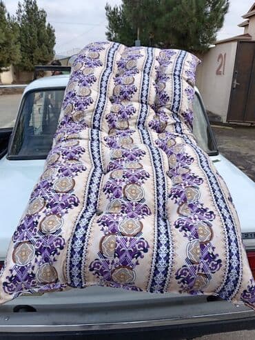 Balış üzləri: Təzə yun doşəklər. 1 nəfərlik doşək 40 manat. 2 nəfərlik taxt doşək — 2