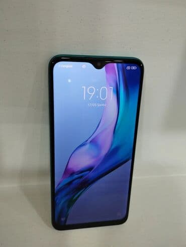 телефон fly cirrus 9: Xiaomi Redmi 9 (Aqua Green) - Ekran: 6.53" Full HD+ IPS, damla — 1