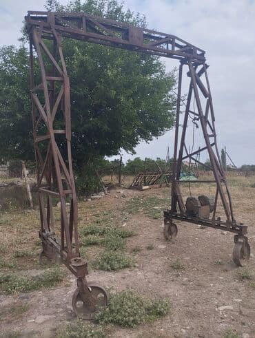 Metall konstruksiyalı mobil portal kran (qaldırıcı çərçivə) -