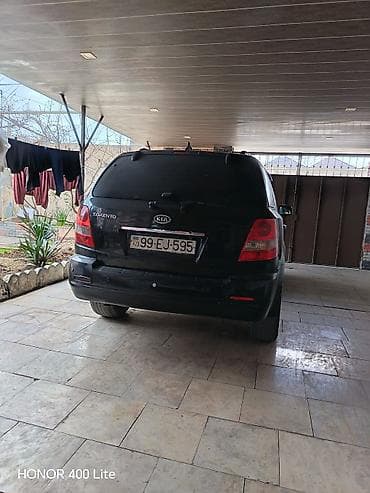 vito oturacaq: Kia Sorento, qara rəng, SUV kuzov. Güclü və rahat ailə maşını — 9