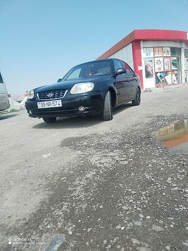 ij diski: Hyundai Accent sedan Xüsusiyyətlər: - Korpus: 4 qapılı sedan - Rəng — 6