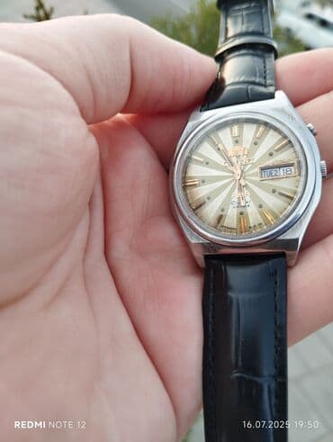 золотые часы geneve 750 цена: Б/у, Наручные часы, Orient, цвет - Красный — 1