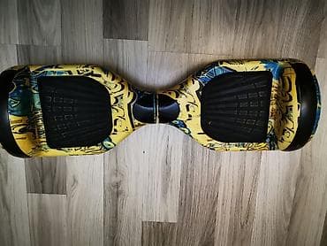 nerd taxta qiymetleri: Elektrik hoverboard – 6.5" təkərlər, rəngli “graffiti” dizayn. - — 2