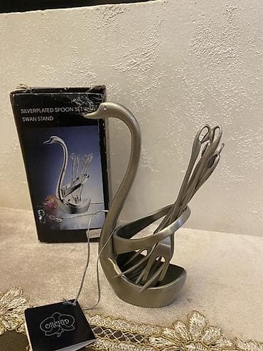 süfre: 2 ədəddir. Gümüşü qu quşu desenli limon götürən — 3