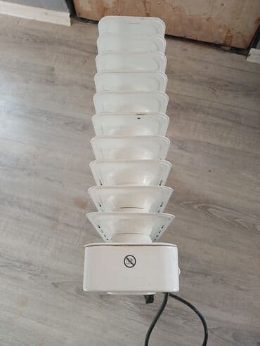 radiator islenmis: Yağ radiatoru, Kumtel, Ünvandan götürmə — 1