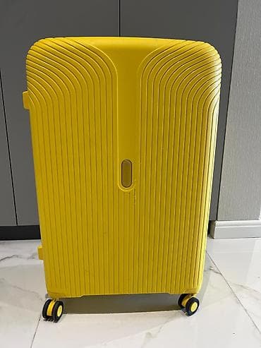 Спортивное питание: Sarı rəngli sərt qabıqlı çamadan səyahət üçün nəzərdə tutulmuşdur — 1