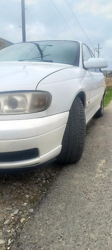 авто фольксваген: Opel Omega B sedan – ağ rəngli, avtomatik ötürücülü. Tecili satilir — 1