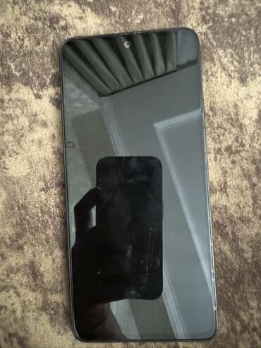 Redmi Note 13, qara rəngdədir. Adaptoru, qutusu və s. yerli