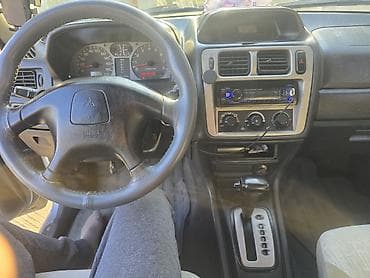 Mitsubishi Pajero iO – 4WD, avtomat - Ban növü: kompakt SUV (Pajero
