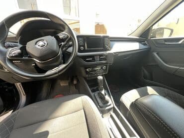 ucuz aftamabil: Skoda Rapid, qara rəng, sedan gövdə. Texniki və komfort — 6