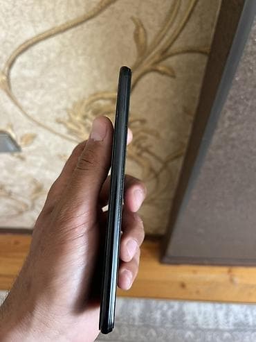 Мобильные телефоны и аксессуары: Xiaomi 11 Lite, 128 ГБ, цвет - Черный, 
 Отпечаток пальца, Две SIM карты, Face ID — 5