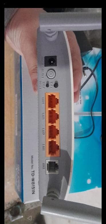 sazz modemi: TP-Link TD-W8151N ADSL2+ Wireless N Modem Router - 150 Mbps-ə qədər — 2