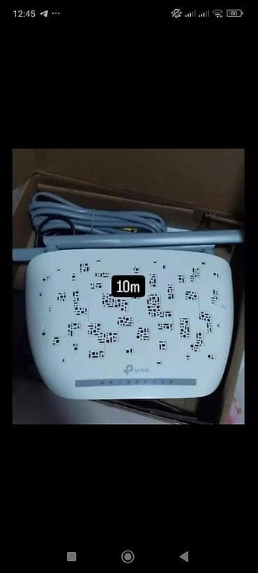 TP-Link simsiz Wi‑Fi router - Brend/model: TP-Link (üstdəki naxışlı