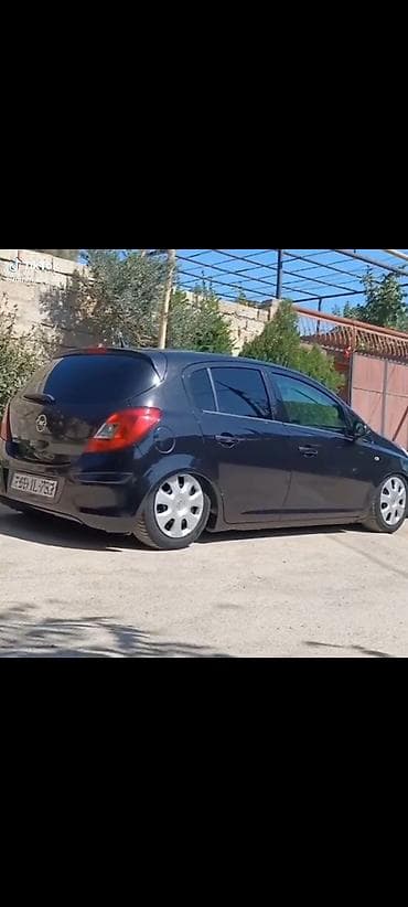 toyota corolla satilir: Opel Corsa D, qara rəng, 5 qapılı hetçbek. Texniki xüsusiyyətlər: - — 5
