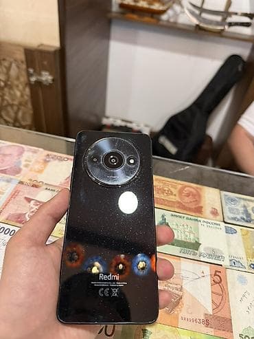 Redmi smartfon - Arxa tərəfdə iri dairəvi modulda kamera sistemi, LED — 1