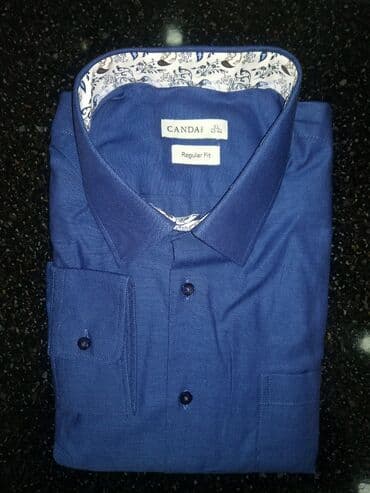 almaniya istehsalı kişi köynəkləri: Uzun qol köynək, material pambığ. Yumşaq maldır. Marka Canda. Alman — 1