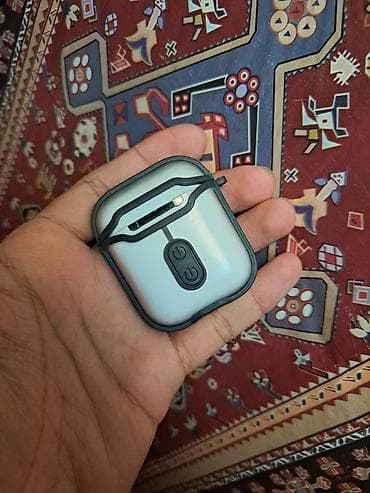 simsiz qulaqlıq: Simsiz qulaqcıq – şarj qutusu ilə - Ağızı yuxarı açılan kompakt şarj — 2