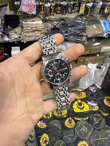 sensor saatlar: Kişi üçün metal qol saatı. Saat klassik və zövqlü dizayna malikdir — 4