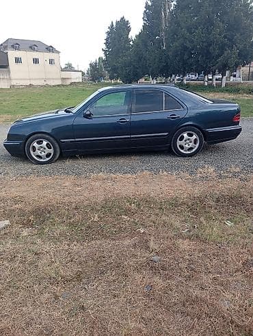 06 diskleri: Mercedes-Benz E-Class: 2.2 l | 1999 il Sedan — 4