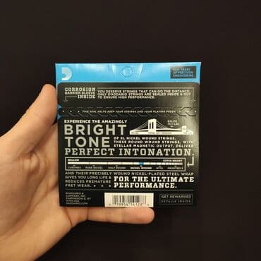 ucuz gitaralar: Elektro gitara simləri Daddario EXL115 Həm yeni başlayanlar, həm — 2