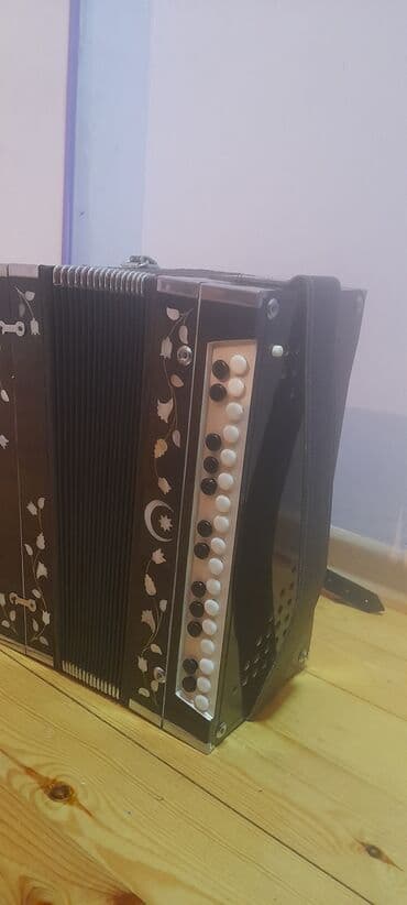 Qarmon, Akustik, İşlənmiş, Ünvandan götürmə