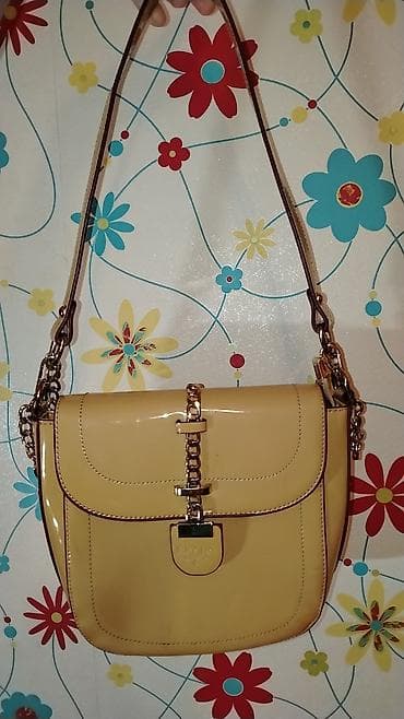 Çiyin çantası, Gucci, İşlənmiş