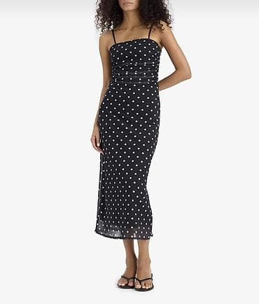 Defacto don Yenidir etiketi üzərində S ölçü Qara rəngli xallı midi don