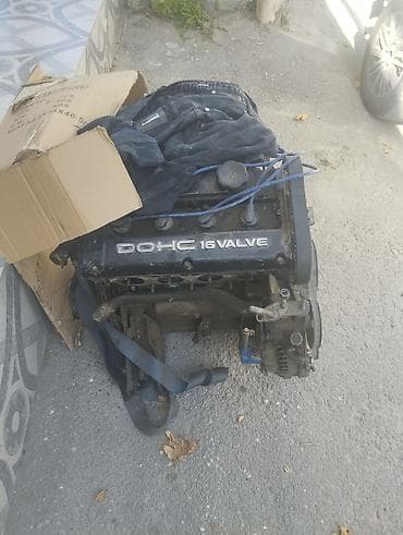 sonata 2003: DOHC 16 VALVE benzin mühərriki - 4 silindrli, iki eksantrik mili — 2