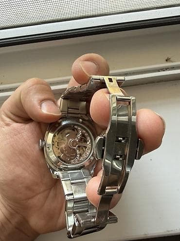 swatch saatlari: Qol saatı, rəng - Gümüşü — 2