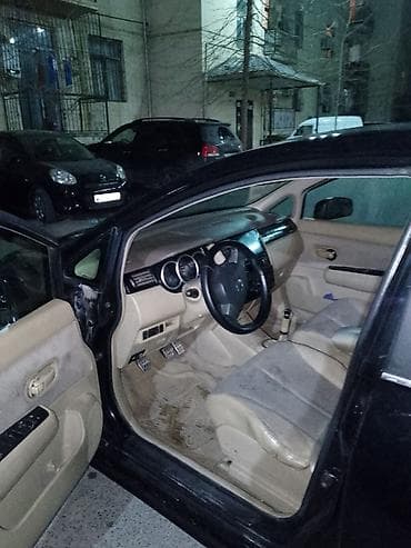 nissan tiida qiyməti: Nissan Tiida sedan – qara rəng, 4 qapı, AZ dövlət nömrə nişanı — 6