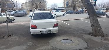 mazda rx 8: Ağ rəngli sedan – Iran Khodro Saipa Saba (Pride) tipli kompakt — 7