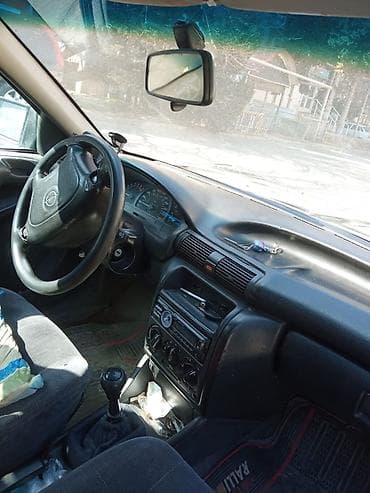 Мототранспорт: Opel Astra: 1.8 л | 1994 г. 443277 км Универсал — 7