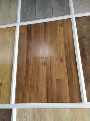 taxta çornu pol: Laminat döşəmə panelləri – müxtəlif ağac fakturaları və rəng çalarları — 1