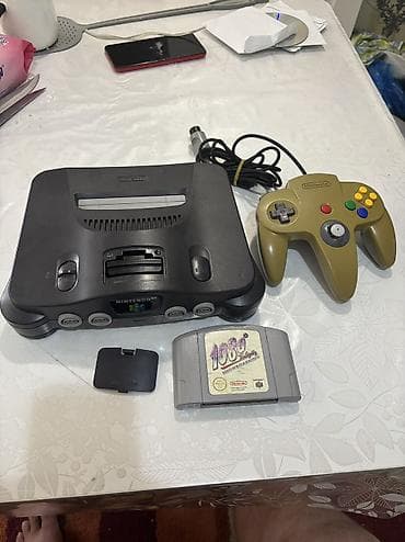 Nintendo 64 normal ishlek veziyetde ustunde 1 katric giymet sondu
