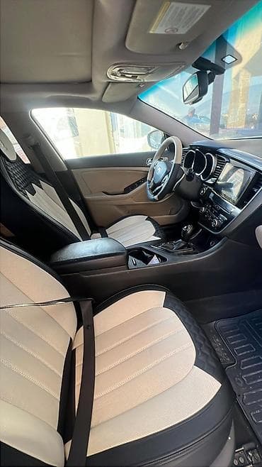 maşin satilir: 2012 Kia Optima servis tam full 15.600 AZN tecılı satılır 
0515437171 — 3
