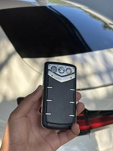Vertu Constellation Quest, цвет - Серебристый, Кнопочный — 2