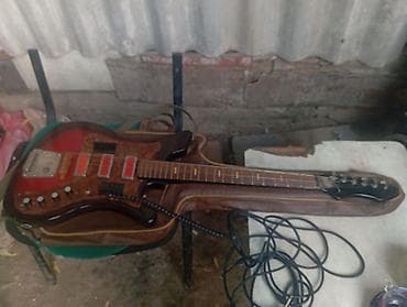 Elektrik gitara – vintage üslublu, 1960–70-lar dizaynına bənzər korpus