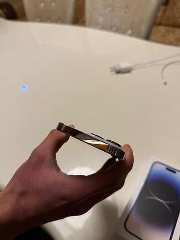 i 15 pods: IPhone 14 Pro, 256 GB, Ağ, Zəmanət, Barmaq izi, Simsiz şarj — 7