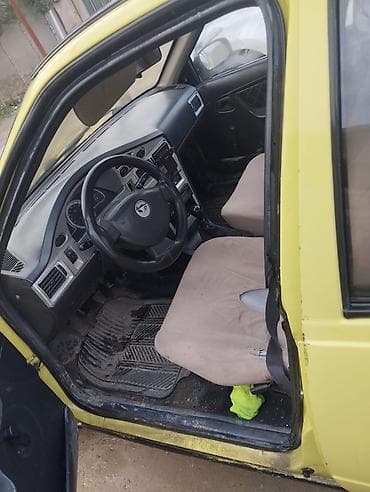 opel astra 98: Model: Daewoo Nexia (sedan) Rəng: açıq sarı Kuzov: 4 qapı, ön və arxa — 5