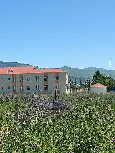 Ağsu Rayon. Pirhəsənlı kəndi məscdin arxasi uşaq bağçası yaninda