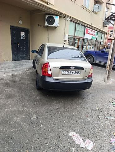 moto debilqe: Hyundai Accent: 1.5 l | 2008 il Sedan — 4