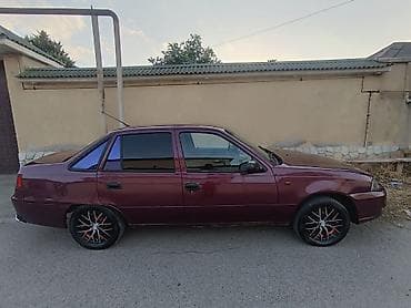 Транспорт: Daewoo Nexia sedan - Kuzov: 4 qapılı sedan, tünd albalı rəng - — 2