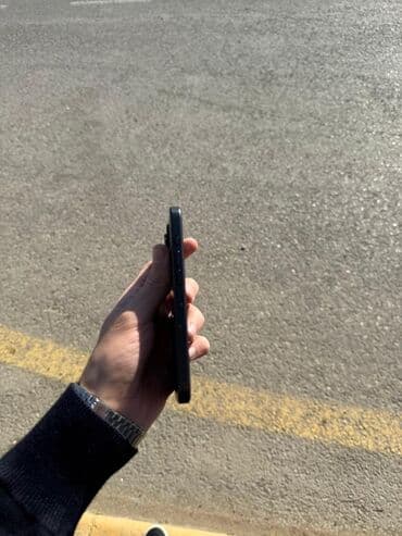 Alcatel: IPhone 15 Pro, Qara, Face ID — 2