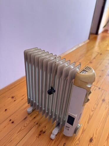тепловентилятор купить в баку: Portativ elektrikli yağlı radiator, effektiv və rahat istilik təmin — 3